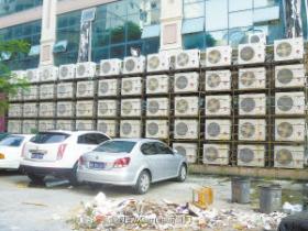 厦门最牛外墙,一面墙挤了53台空调外机